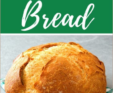 naturally leavened sourdough loaf sitting on a green towel