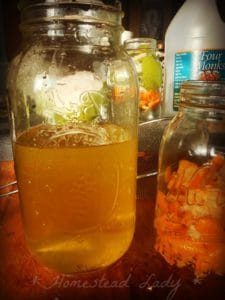 Homemade citrus laundry wash vinegar cleaner by www.homesteadlady.com - ready for use!
