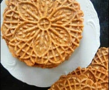 Pizzelle cookies on a white plate