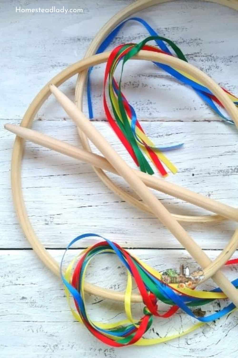 game of graces hoop with sticks on a white table
